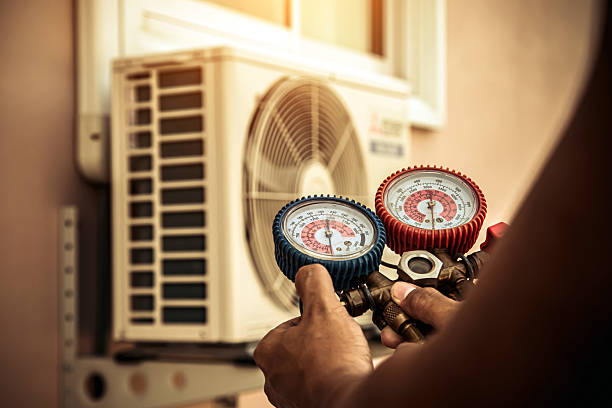 Professional Hvac technician working in Imlaystown, NJ